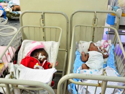 To take my twins to india for heart medication whom were born with hole on their heart