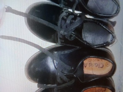A pair of school shoes - a happy child.