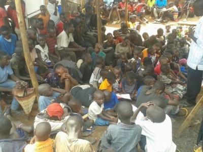 Feeding poor homeless children in uganda.